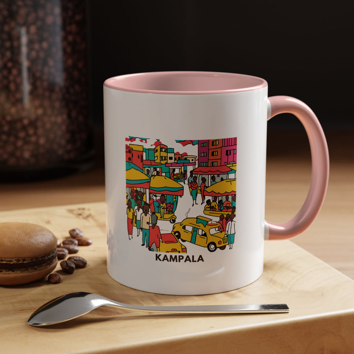 A chic Kampala mug celebrating the city’s lively atmosphere. Dishwasher and microwave safe, it’s perfect for coffee or tea lovers. Its intricate design highlights Kampala’s cultural landmarks, making it an ideal gift or travel souvenir.