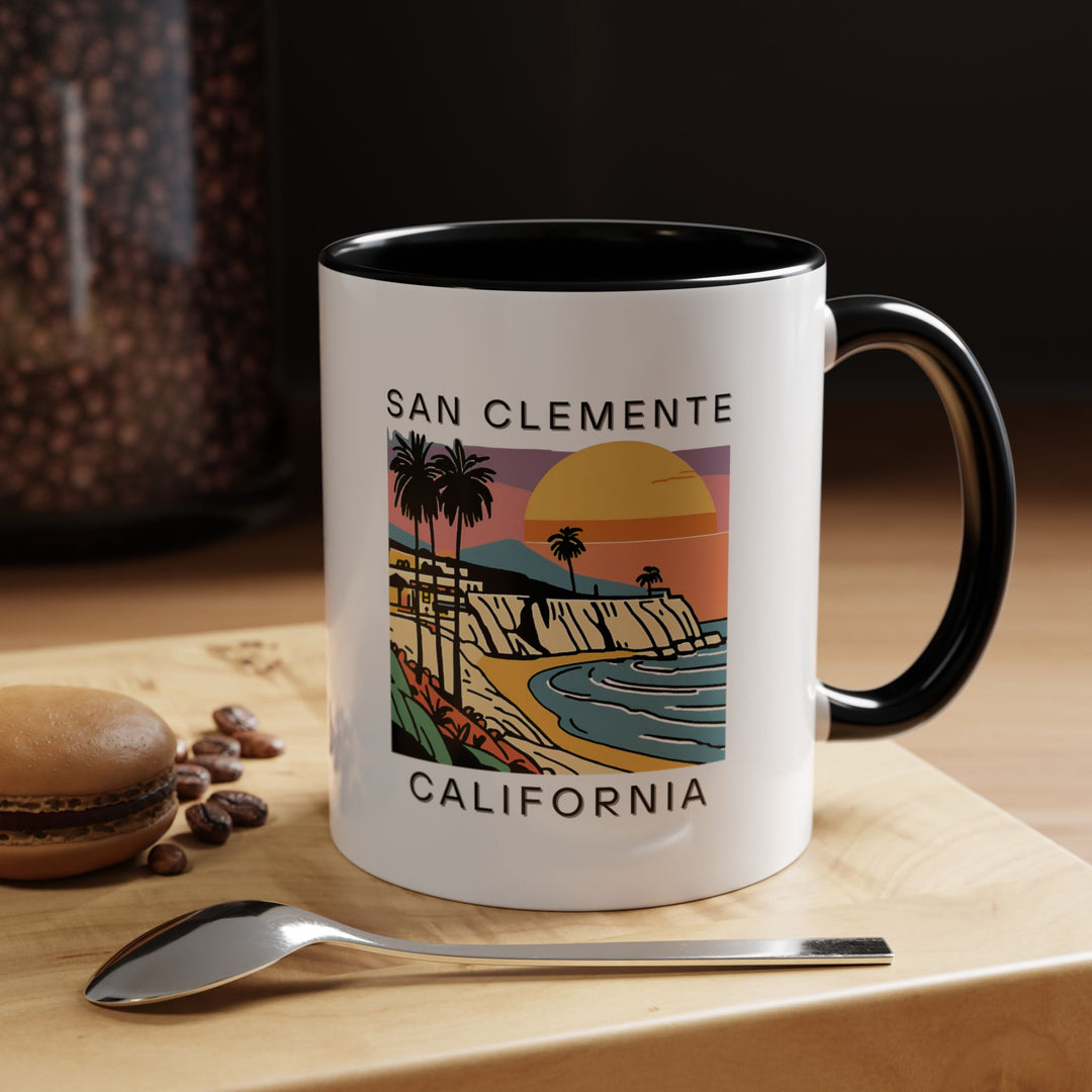 Sip your coffee in style with this San Clemente California mug. With its stunning beach-themed artwork and durable ceramic construction, this mug is ideal for everyday use. Dishwasher and microwave safe, it’s perfect for gifting or personal use.