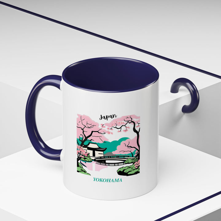 Celebrate the spirit of Yokohama with this mug featuring rich images of the citys cultural highlights. Dishwasher and microwave safe, made from durable ceramic, it is ideal for coffee and tea lovers seeking a unique and artistic mug that captures Yokohamas essence.