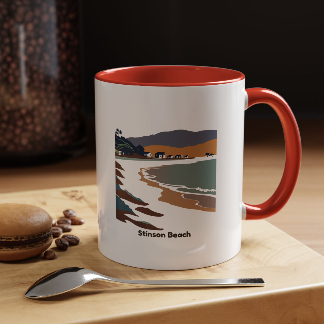 A Stinson Beach Mug featuring a colorful design inspired by the beauty of the California coast. Made from durable ceramic, it is microwave and dishwasher safe, making it a practical gift or a great addition to any beach lover’s collection.