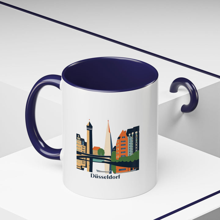 A stylish Düsseldorf mug featuring iconic landmarks and city views. Perfect for coffee or tea, it’s a durable and practical souvenir or keepsake for anyone fond of Düsseldorf’s rich cultural heritage.