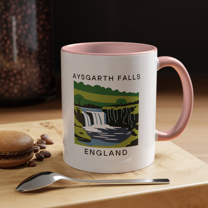 Bring home a piece of Aysgarth Falls with this beautifully designed mug. Featuring detailed artwork of the iconic waterfall, it is the perfect souvenir or keepsake. Dishwasher and microwave safe, it is an excellent gift for nature enthusiasts.