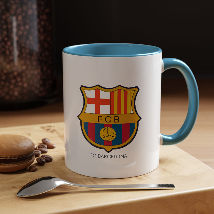 This FC Barcelona mug showcases vibrant colors and artistic designs celebrating the football club’s heritage. Made from durable ceramic and dishwasher-safe, it is perfect for coffee or tea lovers. An ideal gift for fans of FC Barcelona.