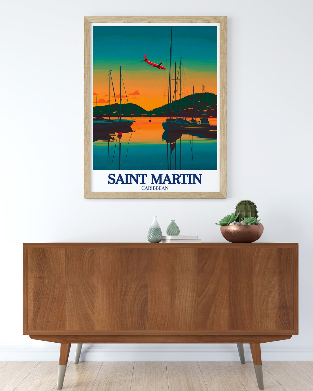 A vibrant poster print capturing the thrill of Maho Beach in Saint Martin, where airplanes fly directly overhead as beachgoers relax below. The poster also highlights the peaceful beauty of Marigot Bay, offering a perfect balance between adventure and relaxation for Caribbean décor lovers.