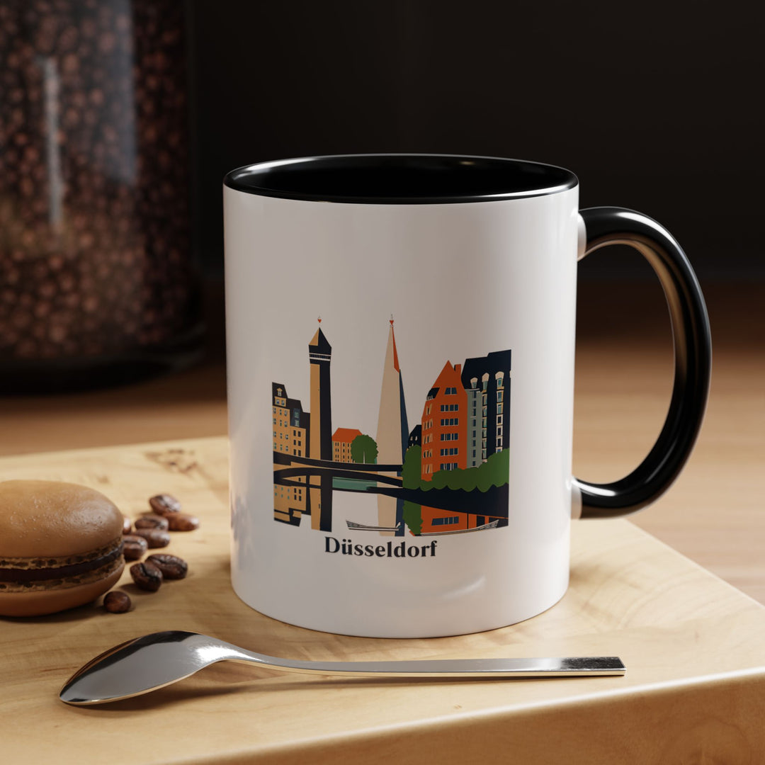 A Düsseldorf mug displaying beautiful artwork of the city’s scenic views and landmarks. Ideal for coffee or tea lovers, this mug is perfect as a souvenir or keepsake for those who love Düsseldorf. Dishwasher-safe and practical.