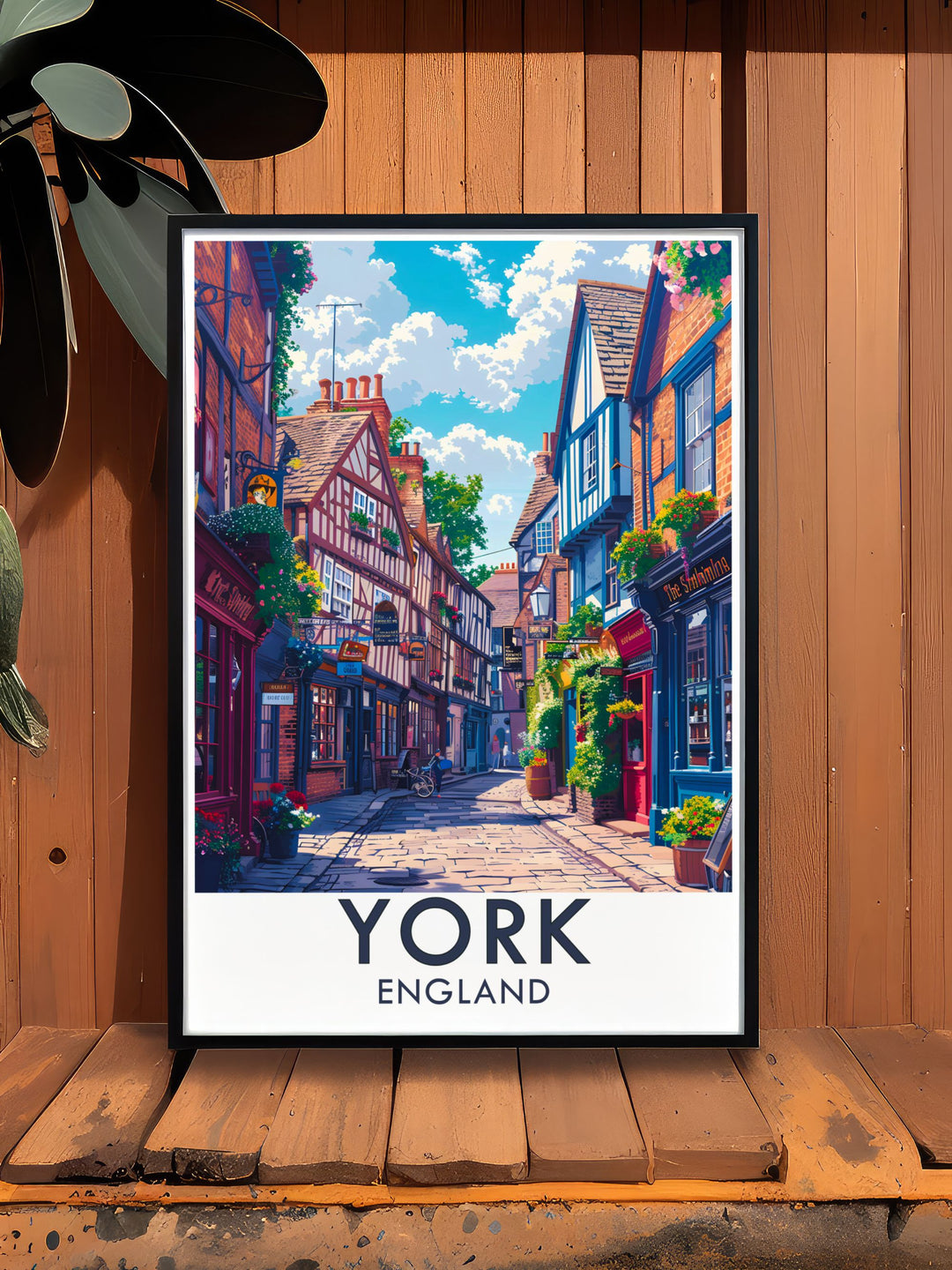 This York poster print captures the enchanting charm of The Shambles, showcasing its narrow cobbled streets and historic timber framed buildings. Perfect for lovers of history and architecture, this artwork brings the beauty of York into your home.