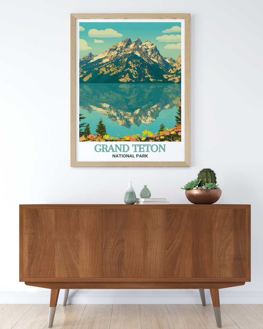 Jenny Lake wall art showcasing the breathtaking scenery of Grand Teton National Park, with the rugged Teton Range reflected in the tranquil waters. This print captures the beauty and grandeur of the Tetons, making it a perfect addition to any decor, ideal for those who love travel and nature.