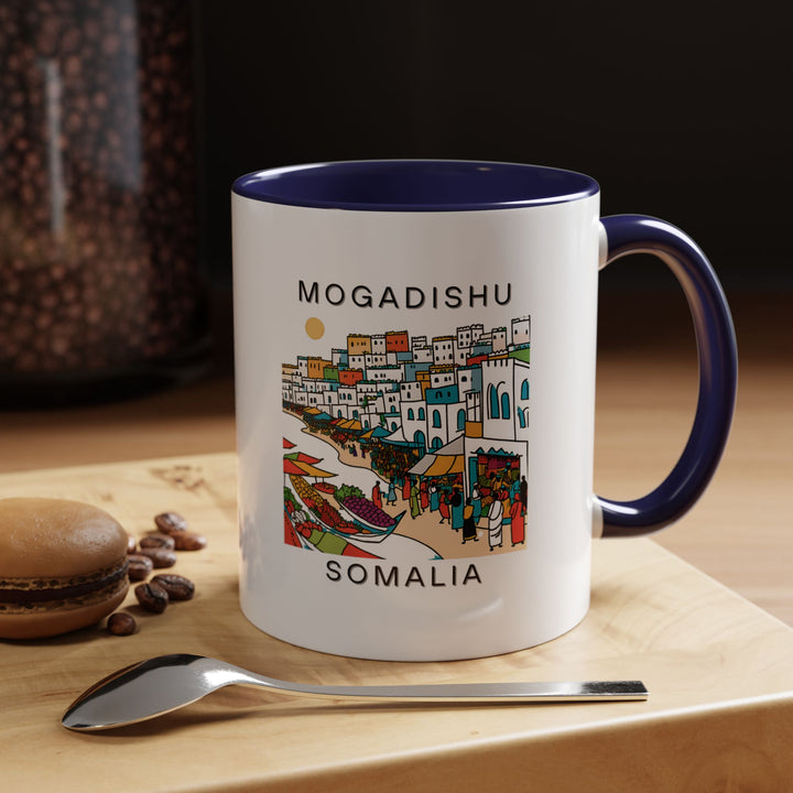 This stunning Mogadishu Somalia mug captures the essence of the city with beautiful artwork. Perfect for coffee lovers, it is dishwasher-safe and microwave-safe, offering both style and practicality. A perfect gift or keepsake for travelers and Somalia enthusiasts.