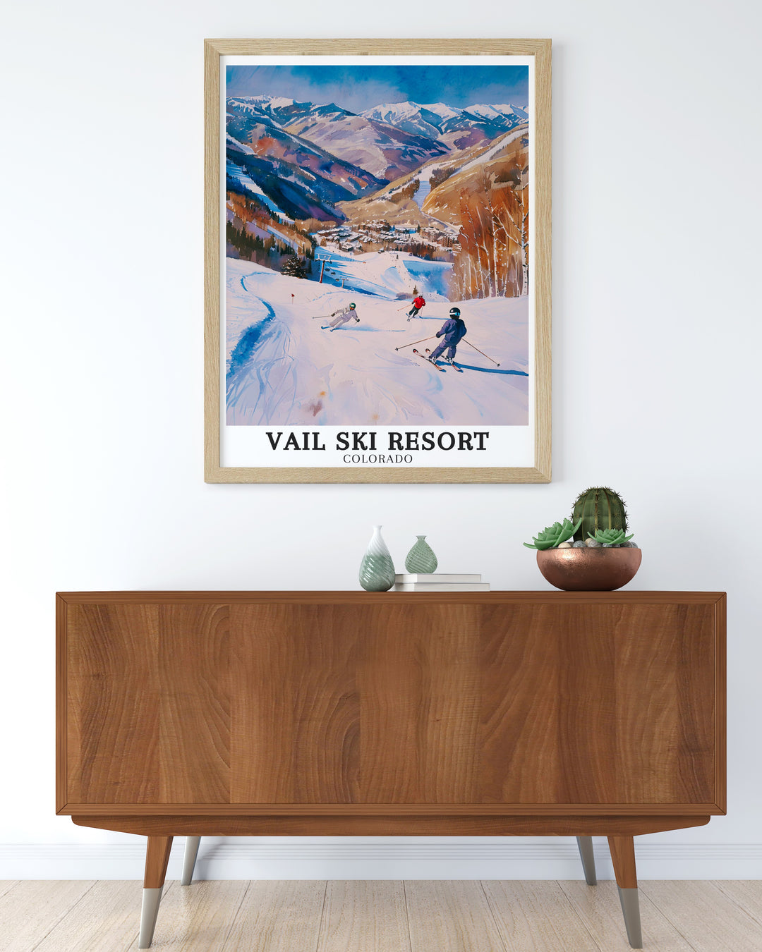 Highlight the grandeur of Vail Mountain with this framed art, depicting the vast snowy slopes of Colorados famous ski resort. The piece also features the cozy charm of Vail Village, making it an excellent gift for winter sports lovers and mountain enthusiasts.