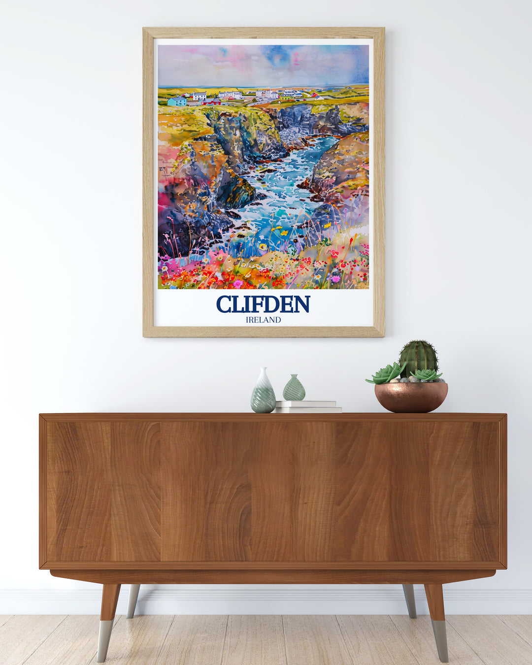 Decorate your space with this travel poster of Clifden, showcasing the towns unique location on the Wild Atlantic Way and within the Connemara region. The print captures the rugged beauty of Irelands western coast, making it a standout piece in any room.