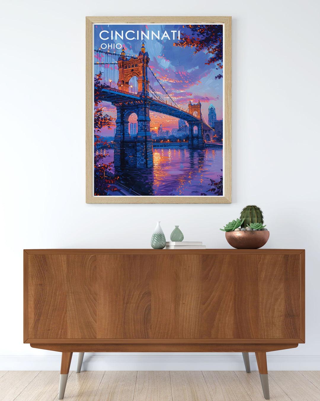 Admire the grandeur of Cincinnati with a travel poster featuring the Roebling Suspension Bridge. This print captures the architectural brilliance and historical significance of one of Ohios most iconic landmarks.