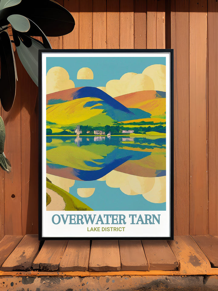 Overwater Tarn wall art capturing the picturesque landscape of the Lake District. This travel print features Overwater Tarn with the Skiddaw fells in the background, creating a calming atmosphere in your home. A beautiful addition for those who appreciate nature.