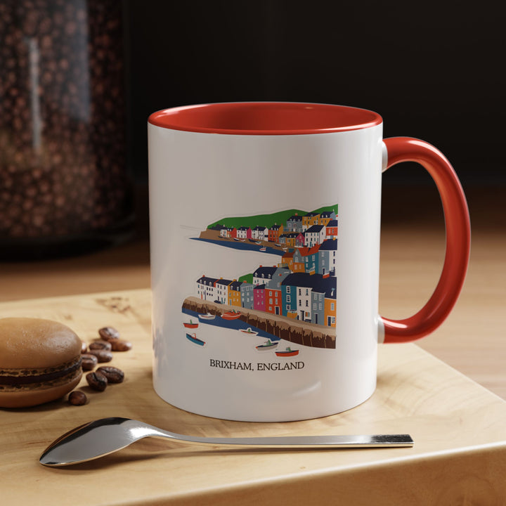 A stylish Brixham England mug featuring artwork of the town’s famous harbor and scenic coastlines. Perfect for any coffee or tea enthusiast, this mug is both dishwasher and microwave safe, making it a practical and artistic addition to any collection.