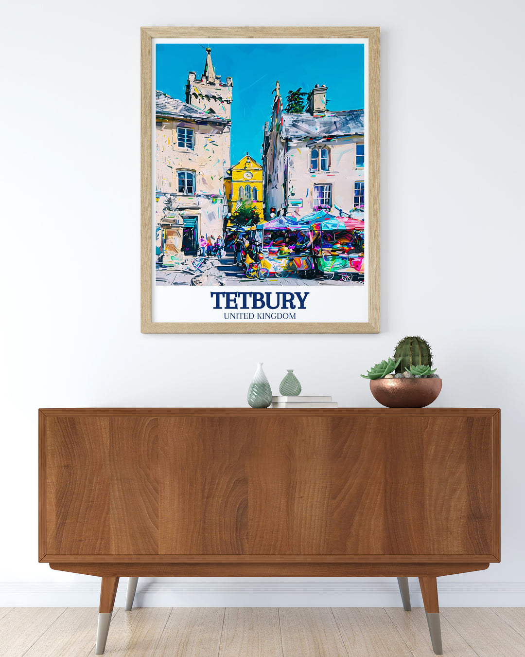 Our Tetbury travel poster offers a detailed view of the towns historic Market Square and Town Hall. This piece is perfect for adding a touch of English countryside beauty to your home decor, making it a great gift for lovers of history and travel.