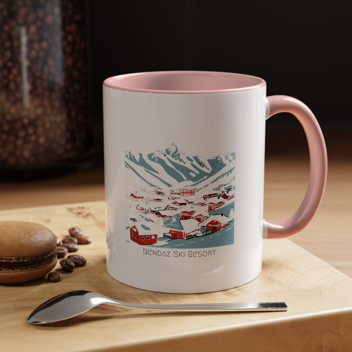 A Nendaz Mug with beautiful artwork of the Swiss Alps, capturing the essence of this ski destination. This ceramic mug is microwave-safe and dishwasher-safe, making it perfect for your morning coffee or hot chocolate.