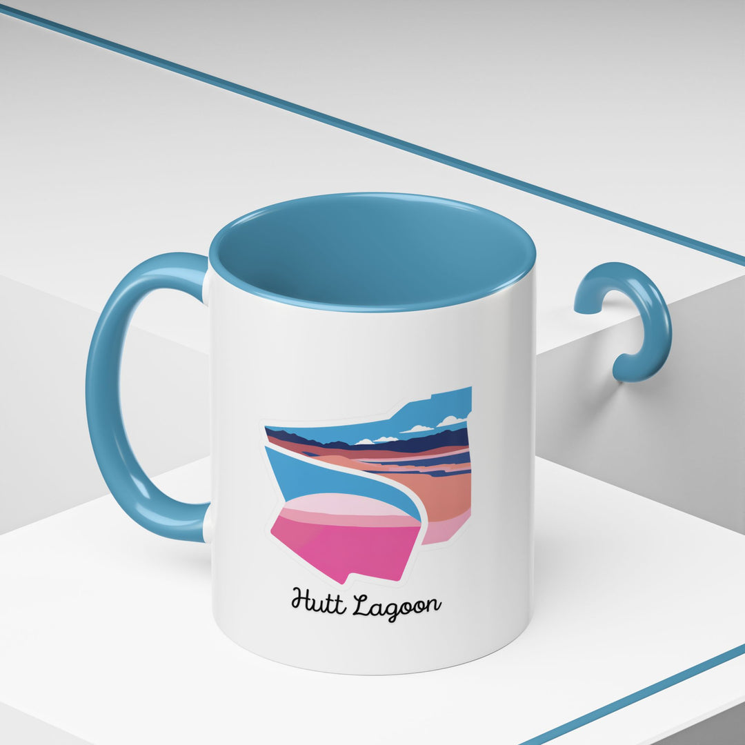 Experience the magic of Hutt Lagoon with this ceramic mug, showcasing vibrant designs inspired by the lake's natural hues. Dishwasher-safe and practical, it is ideal for coffee lovers and travelers alike.