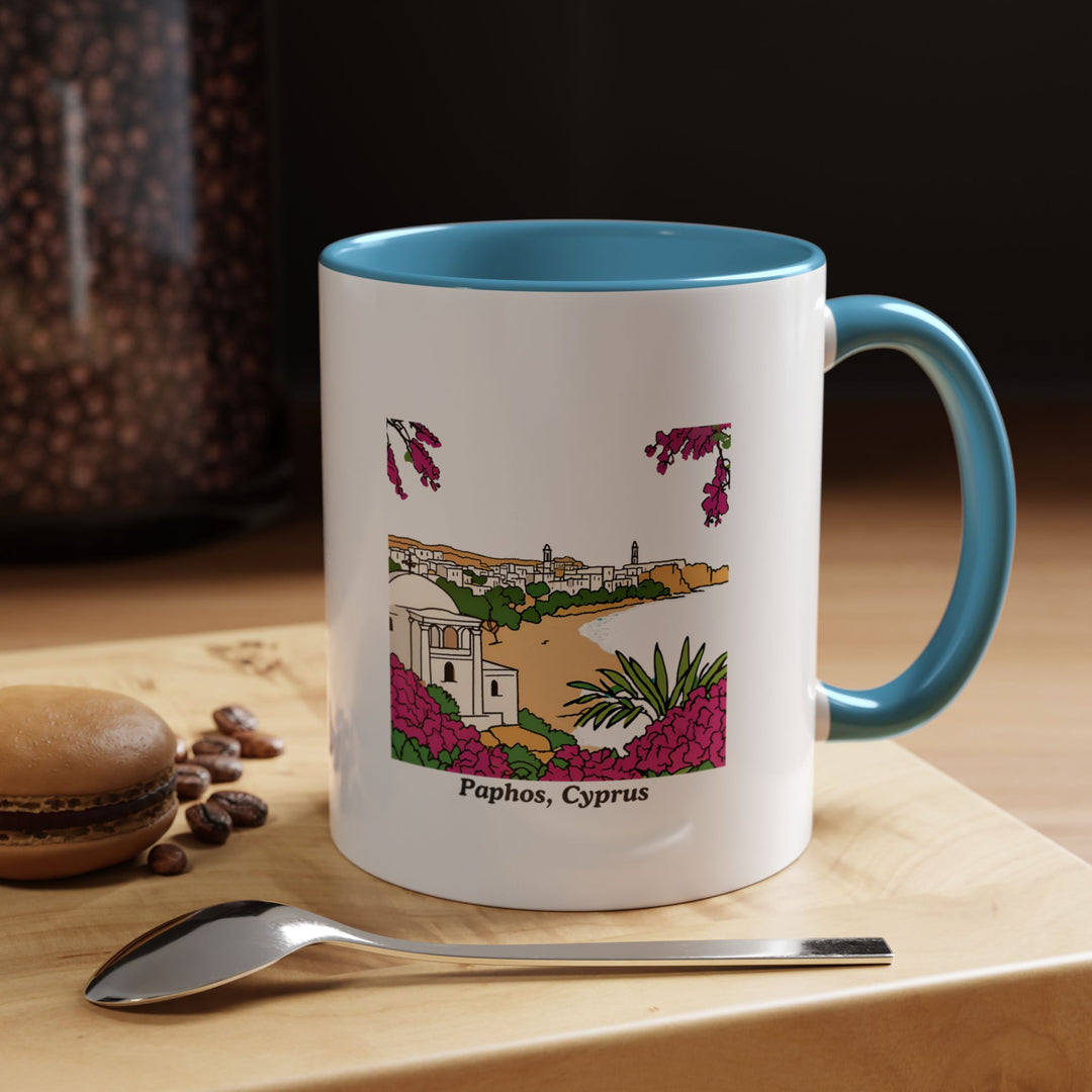 A ceramic Paphos Cyprus Mug featuring bold and intricate artwork inspired by Paphos's scenic coastlines and Mediterranean spirit. Dishwasher safe, this mug is perfect for everyday use or as a memorable gift.