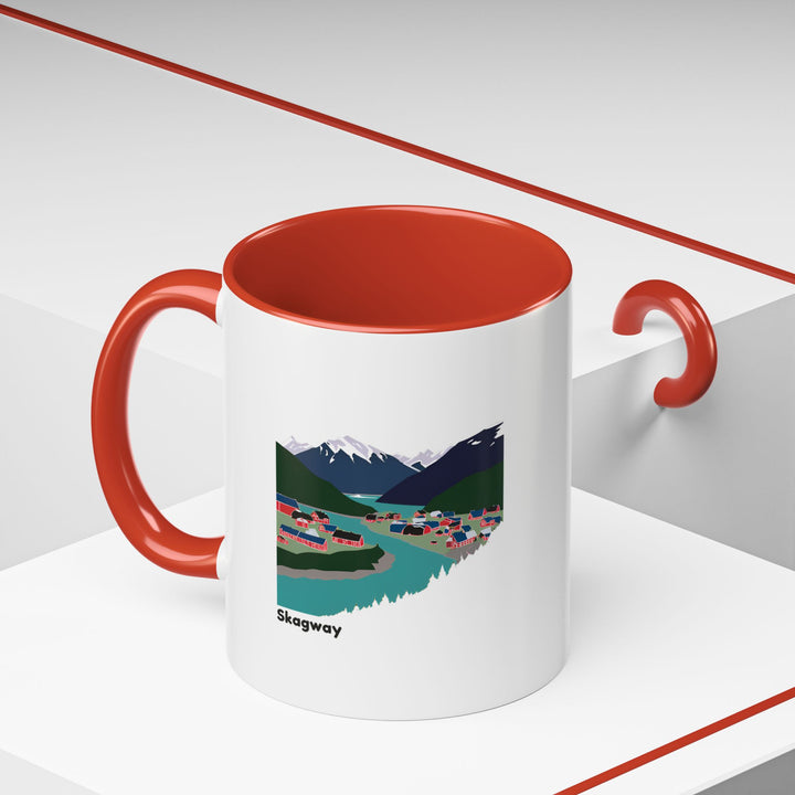 The Skagway Alaska Mug is a unique ceramic mug showcasing Alaska's wilderness in colorful artwork. Dishwasher-safe and microwave-safe, it is perfect for coffee, tea, or gifting to adventure lovers.