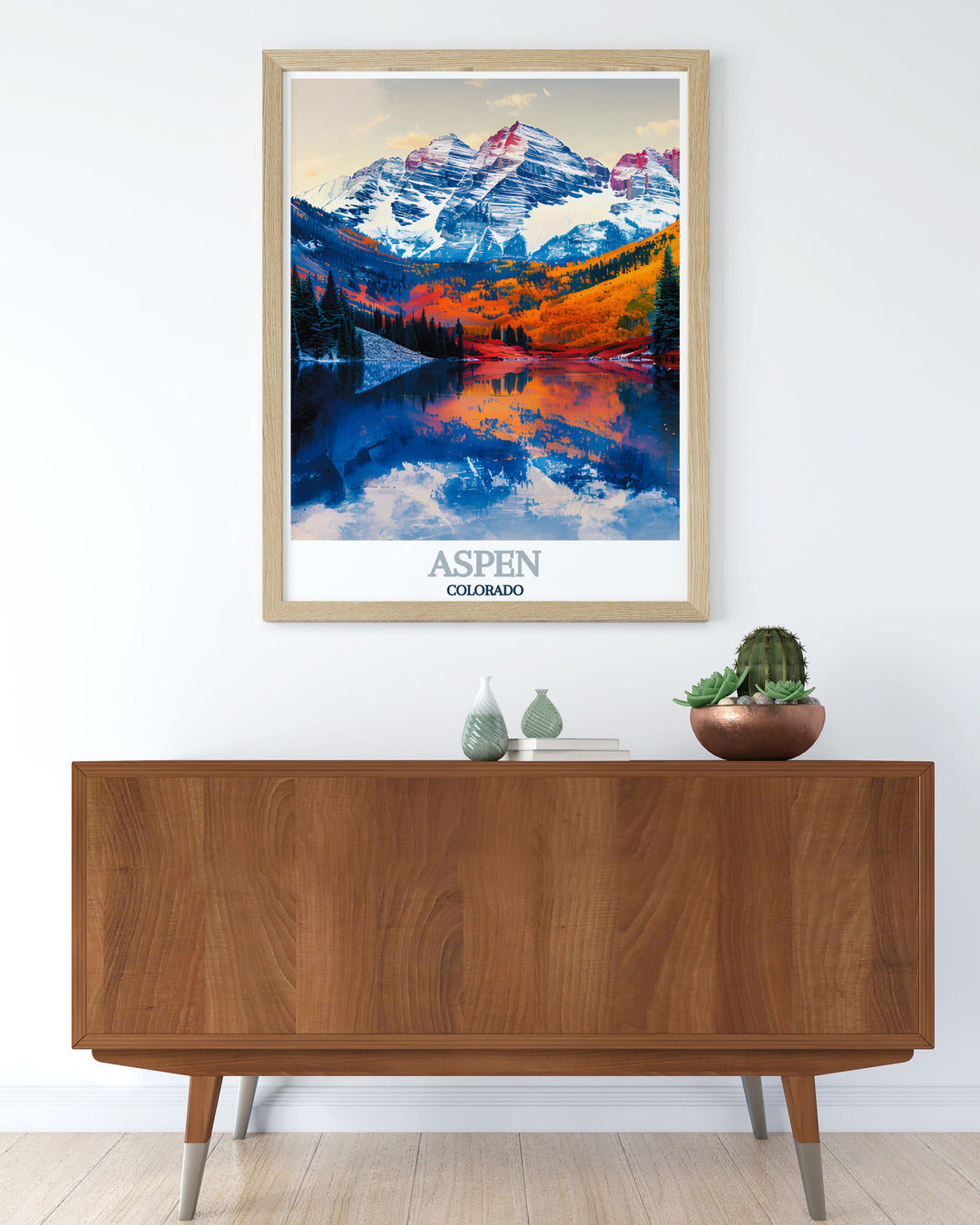 Featuring the iconic Maroon Bells, this travel poster brings the serene beauty of Colorados Rocky Mountains into your home, making it an ideal piece for mountain and nature lovers.