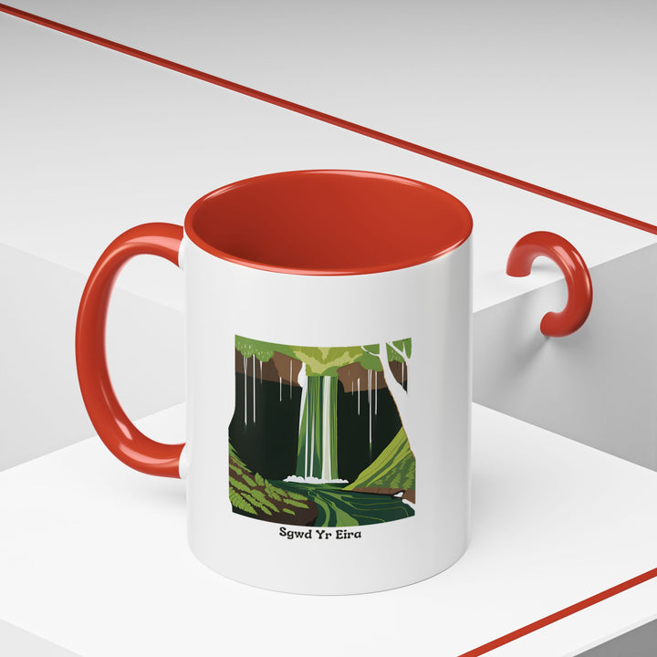 A vibrant Sgwd Yr Eira Waterfall Mug showcasing Wales's scenic wonder. Durable ceramic, dishwasher-safe, and microwave-safe, it makes a meaningful gift or personal keepsake.