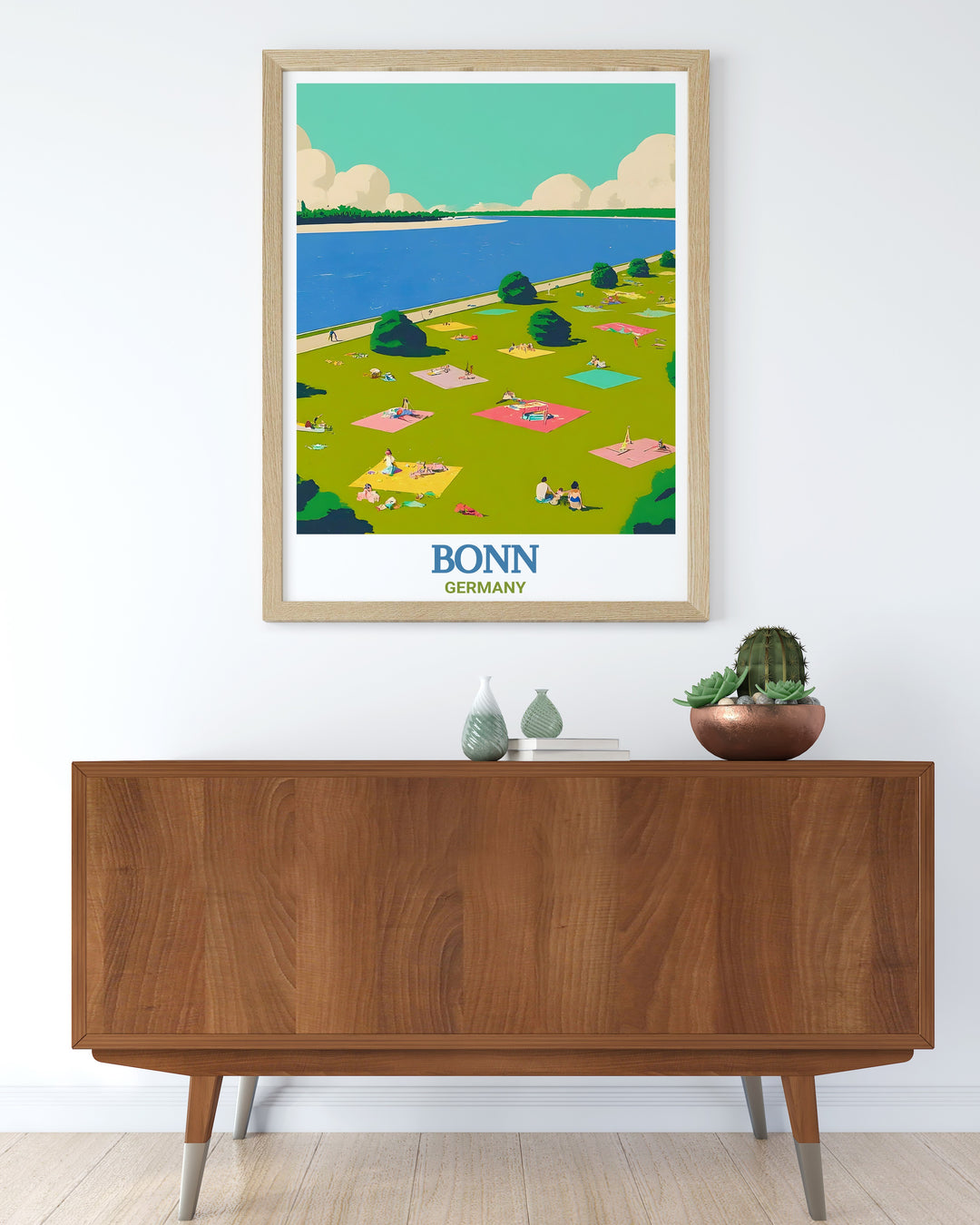 Bonn travel print captures the picturesque beauty of Rheinaue Park, highlighting its wide open meadows and lakeside paths. This travel poster is perfect for those who want to bring the calm and charm of Bonns outdoors into their home.