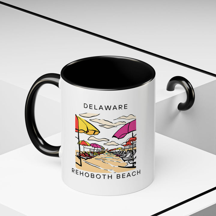 This mug showcases the stunning Rehoboth Beach landscape, making it a perfect gift for fans of this coastal town. With vibrant colors and durable ceramic construction, it’s both functional and decorative. Microwave and dishwasher safe for convenience.