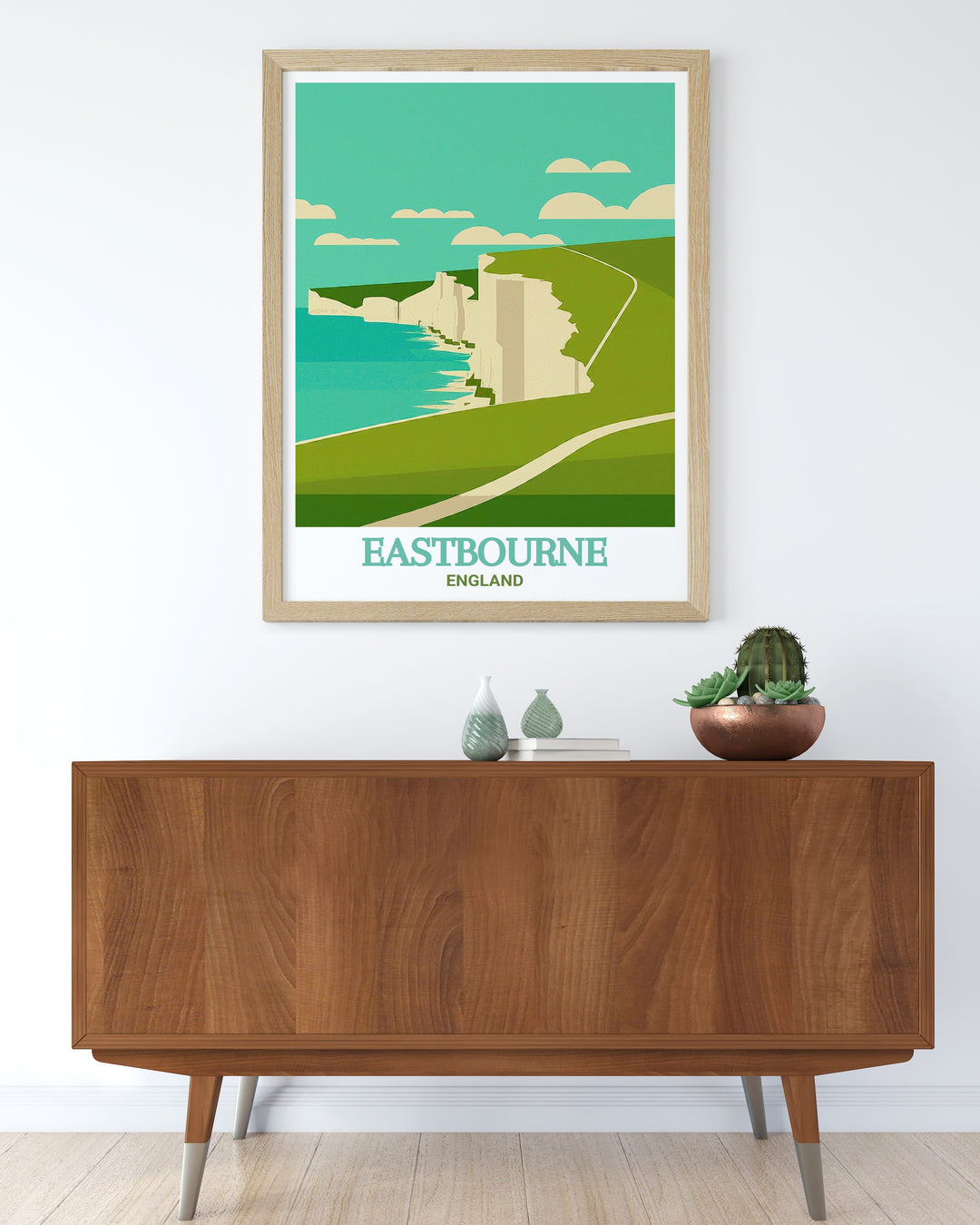 Eastbourne travel poster highlighting the breathtaking scenery of Beachy Head along the South Downs Way. This print showcases the striking contrast between the white cliffs and the deep blue sea, making it a perfect addition to any coastal decor.