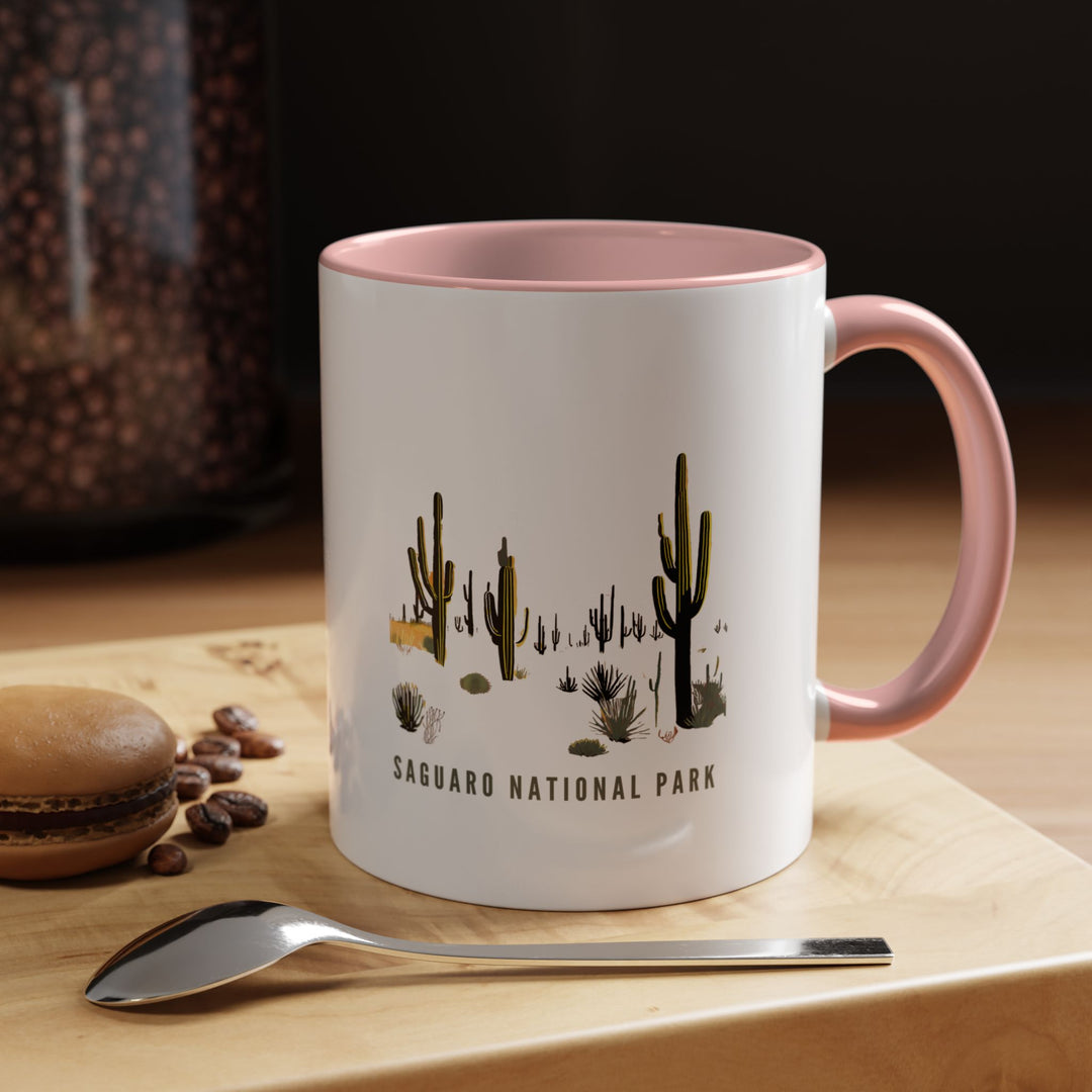 A stylish Saguaro National Park mug perfect for coffee and tea lovers. Showcasing vibrant artwork of iconic cacti and desert vistas, it is made from durable ceramic. Dishwasher and microwave safe, this mug is a thoughtful gift or keepsake for those who love nature and adventure.