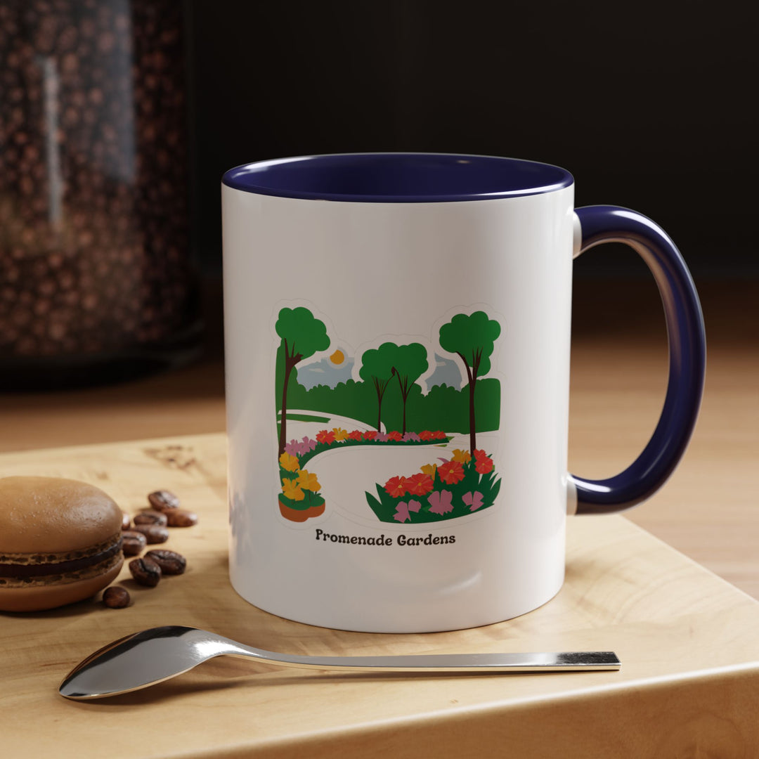 A ceramic Promenade Gardens Guyana Mug with vibrant artwork inspired by lush greenery and flowers. Perfect for daily use, it is dishwasher-safe, microwave-safe, and a thoughtful gift for nature lovers and art enthusiasts.