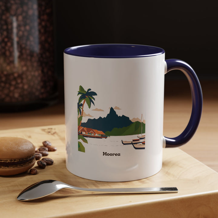 A beautifully designed Mo'orea Mug featuring vibrant artwork inspired by Mo'orea's tropical landscapes and lagoons. This dishwasher-safe ceramic mug is perfect for coffee lovers and makes a thoughtful gift or keepsake for fans of French Polynesia.