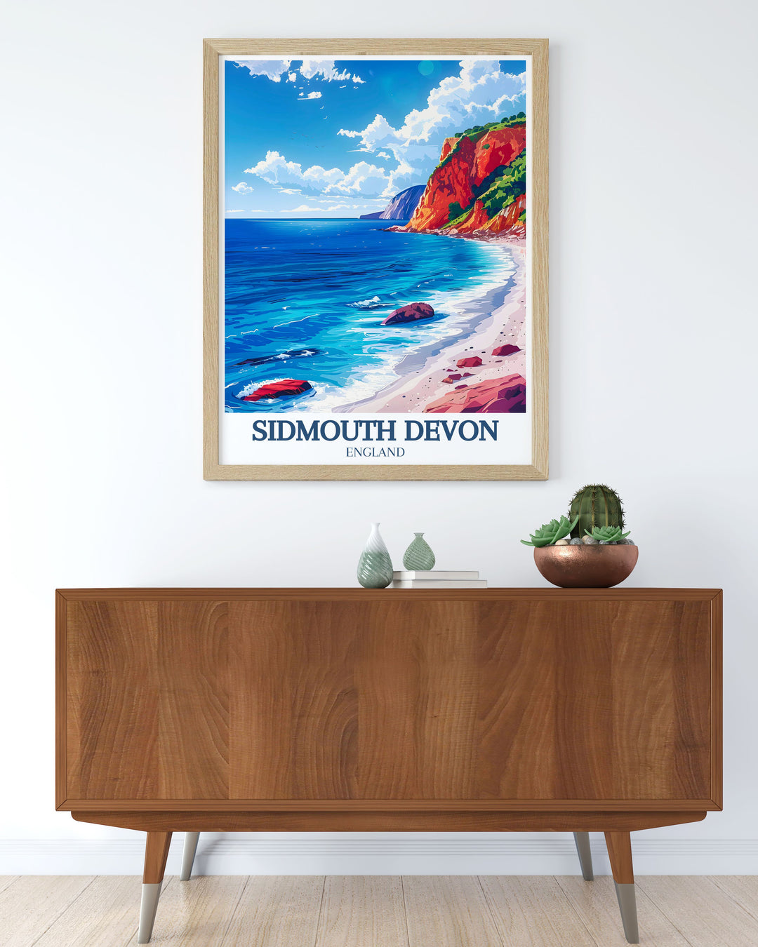 The Jurassic Cliffs and Sidmouth Beach are beautifully depicted in this travel poster, celebrating the iconic landmarks and natural beauty of Devon, ideal for travel lovers and coastal enthusiasts.