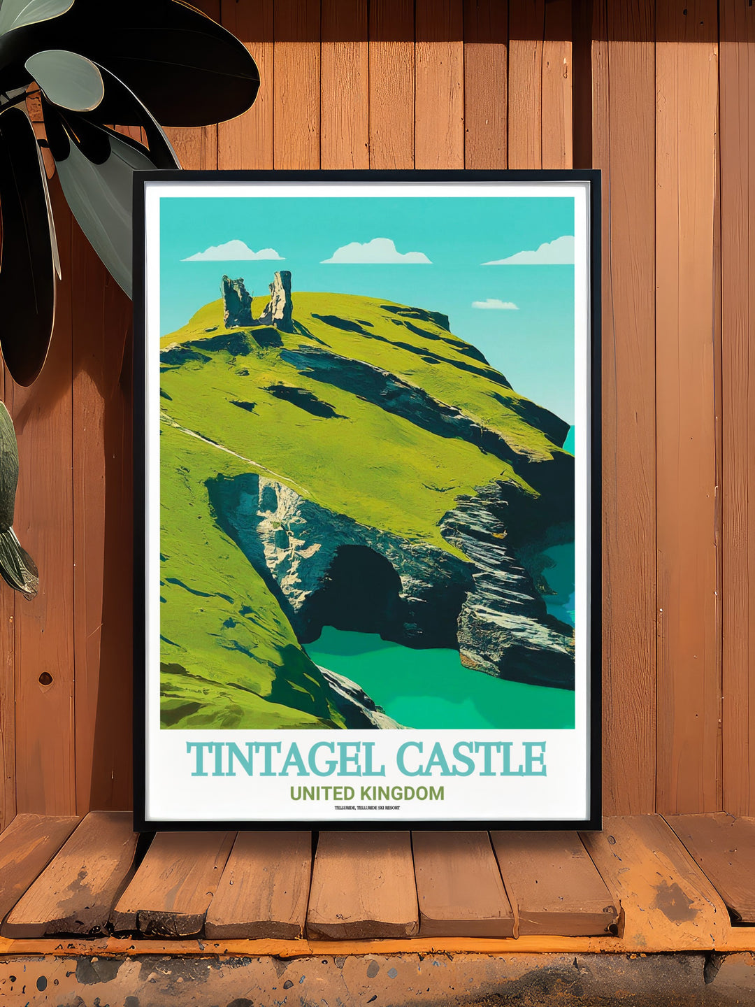 Wall Poster of Tintagel Castle and Merlins Cave, showcasing the rugged beauty of Cornwalls cliffs and the legendary cave beneath the ancient ruins. The perfect print for anyone captivated by British history and mythology.