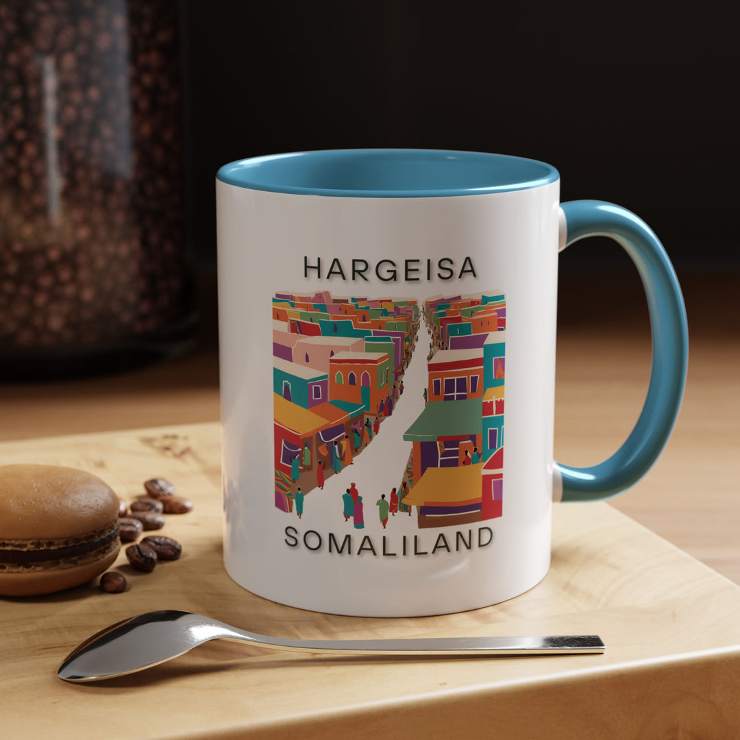 This Hargeisa mug showcases vibrant artwork inspired by the city’s natural beauty and cultural heritage. Made from durable ceramic and dishwasher-safe, it is perfect for coffee or tea and makes a thoughtful gift for fans of Hargeisa.