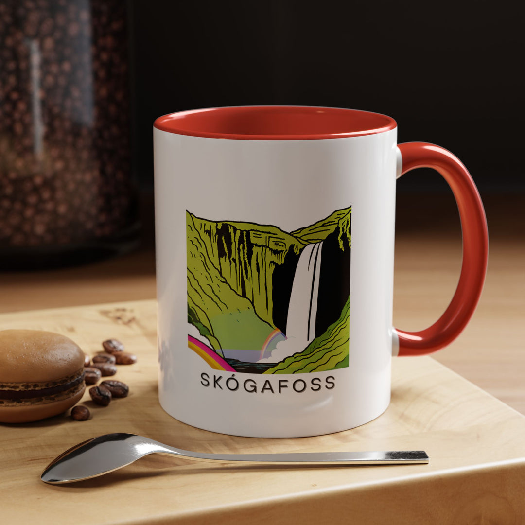 The Skógafoss Iceland mug showcasing the beauty of Iceland’s famous waterfall. Perfect for coffee or tea, it features vibrant artwork of Skógafoss. Dishwasher and microwave safe, this mug makes a thoughtful gift for nature lovers and travel enthusiasts.