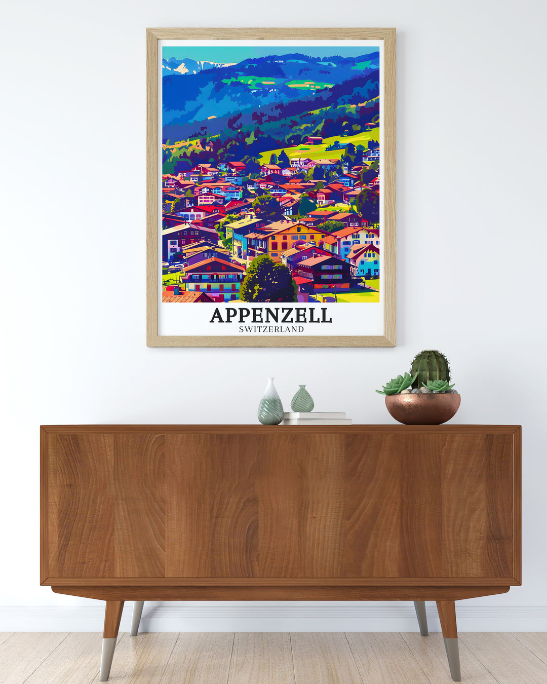 Appenzell poster print showcasing the quaint village nestled in the rolling hills of Appenzellerland, with the dramatic Alpstein massif in the background. This travel print brings the beauty of Swiss landscapes into your home.