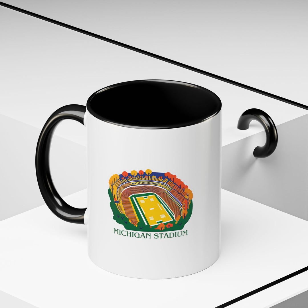 Relive your favorite Michigan Stadium moments with this artistic ceramic mug. Microwave-safe, dishwasher-friendly, and featuring vibrant designs, it is a meaningful gift or collectible.