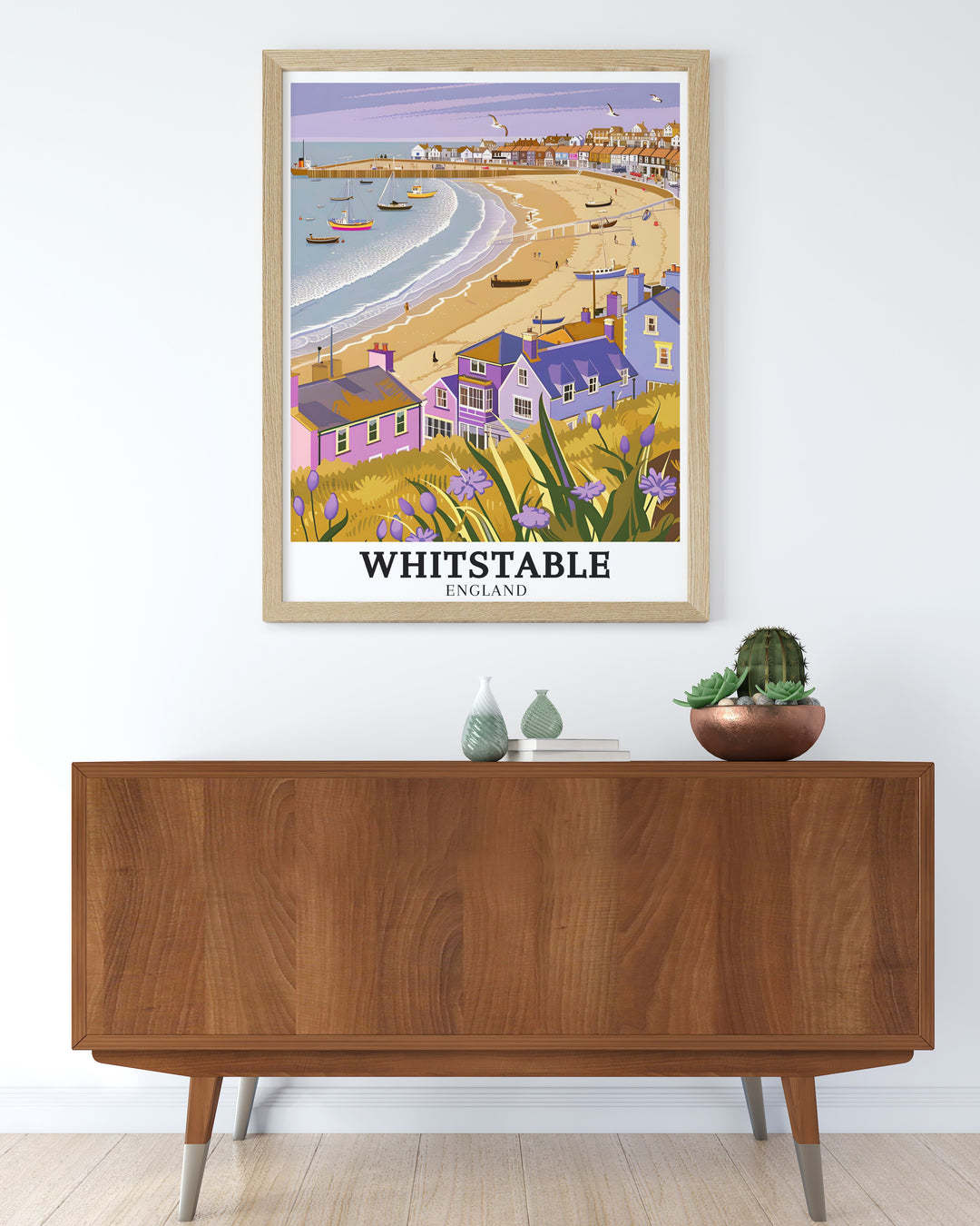 Whitstable Beach wall decor featuring a vibrant illustration of the beach and its surroundings. This print captures the essence of a day at Whitstable Beach, making it a perfect gift for anyone who loves the seaside.