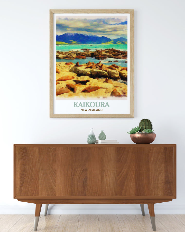 The scenic landscape of Kaikoura is brought to life with bold colors and fine details in this poster print, showcasing the seal colony against a backdrop of mountains and ocean. The artwork is perfect for bringing a touch of New Zealands charm to your home.