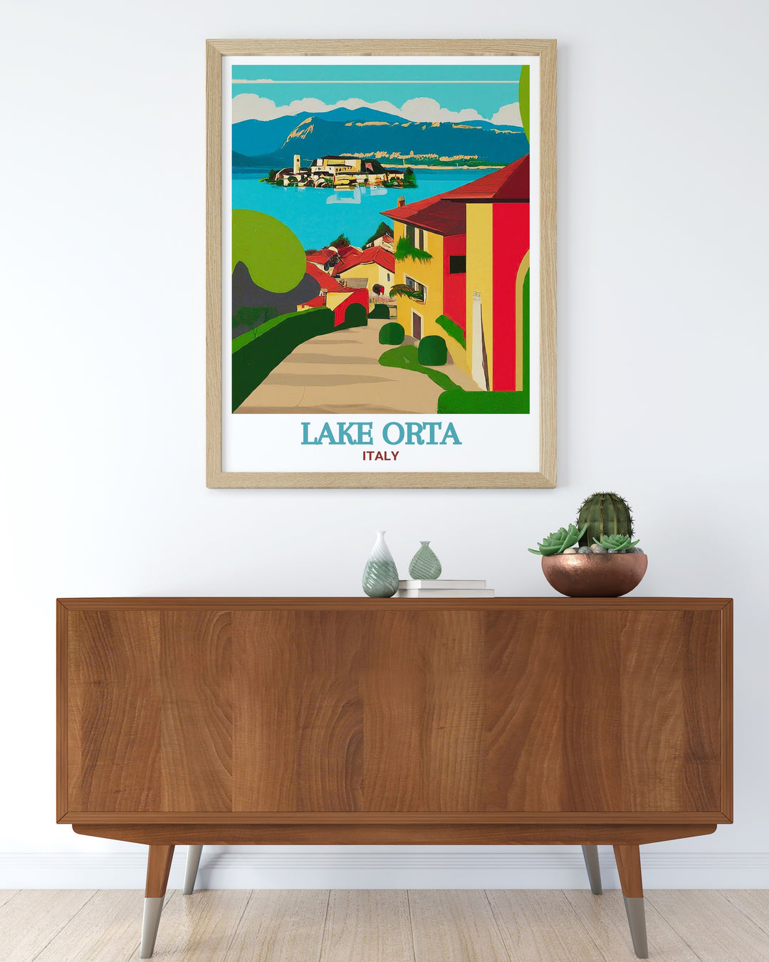 Capture the calm and peaceful atmosphere of Lake Orta with this elegant art print. The beautiful reflections of Orta San Giulios historic buildings on the lakes surface create a stunning visual that will add sophistication to any space.