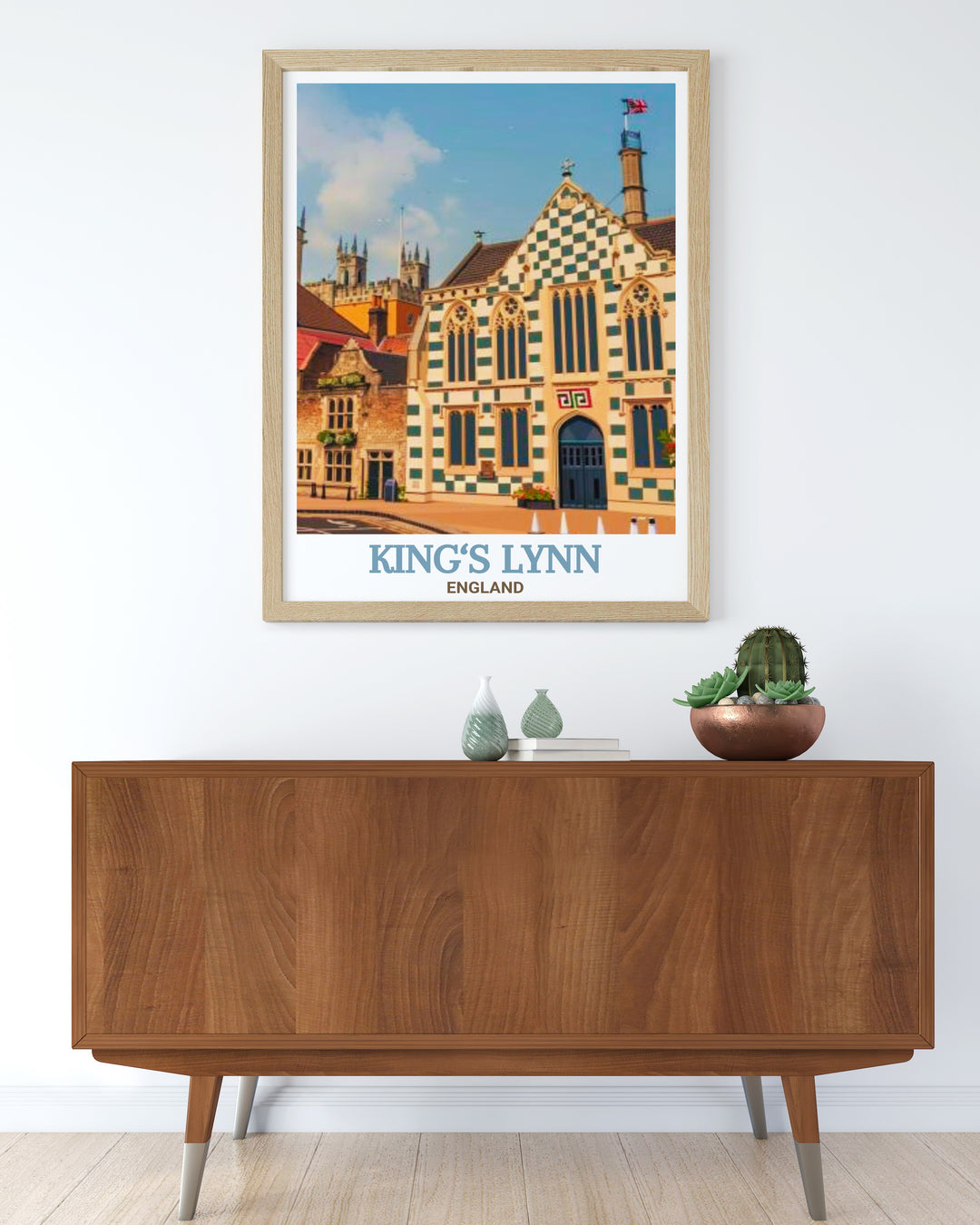 This travel poster of Kings Lynns Town Hall and Trinity Guildhall is ideal for anyone looking to add a touch of Englands rich history to their décor. The detailed artwork is perfect for lovers of English heritage.