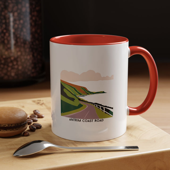 A beautifully crafted Antrim Coast Road mug featuring vibrant coastal artwork. Made from durable ceramic, it is dishwasher and microwave safe. Ideal for coffee lovers, travelers, or anyone who appreciates Ireland's iconic landscapes and rugged coastal beauty.