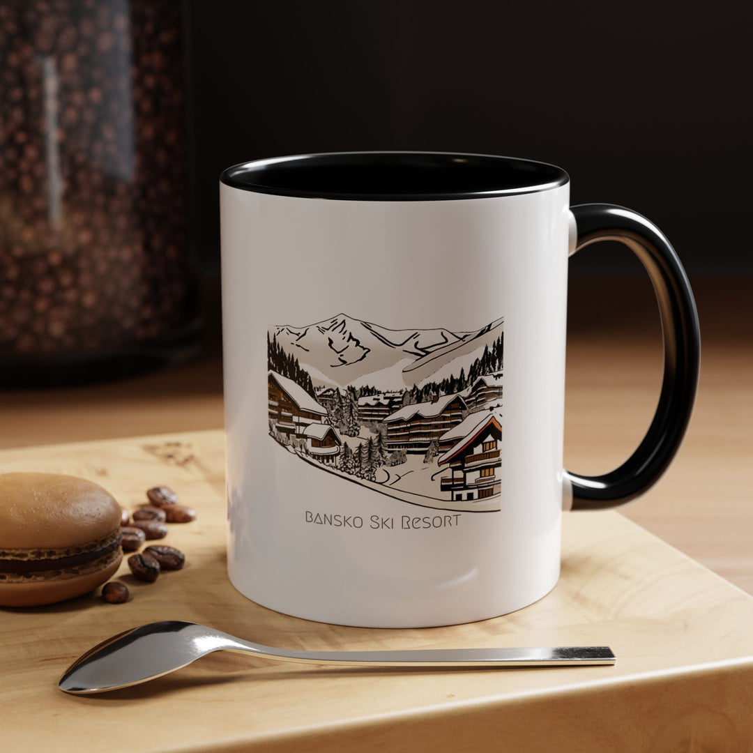 A stylish Bansko Ski Resort mug adorned with snowy mountain designs. Made from durable ceramic and dishwasher safe, it is perfect for coffee lovers, making it an excellent travel keepsake or gift for those who love skiing and winter destinations.