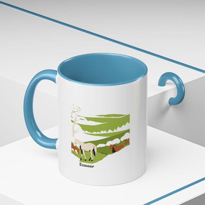 Exmoor mug featuring intricate artwork of the national park's iconic scenery. Durable ceramic with a colorful rim and interior makes it ideal for daily use or as a cherished gift for travelers and nature lovers.