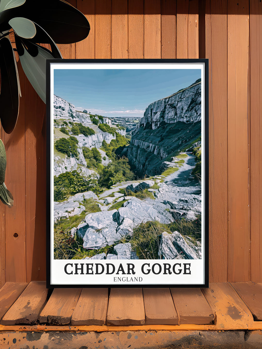 Travel poster of Cheddar Gorge and the Mendip Hills, highlighting the awe inspiring limestone cliffs and lush greenery of Somersets iconic landmark, a great addition to any British countryside décor.