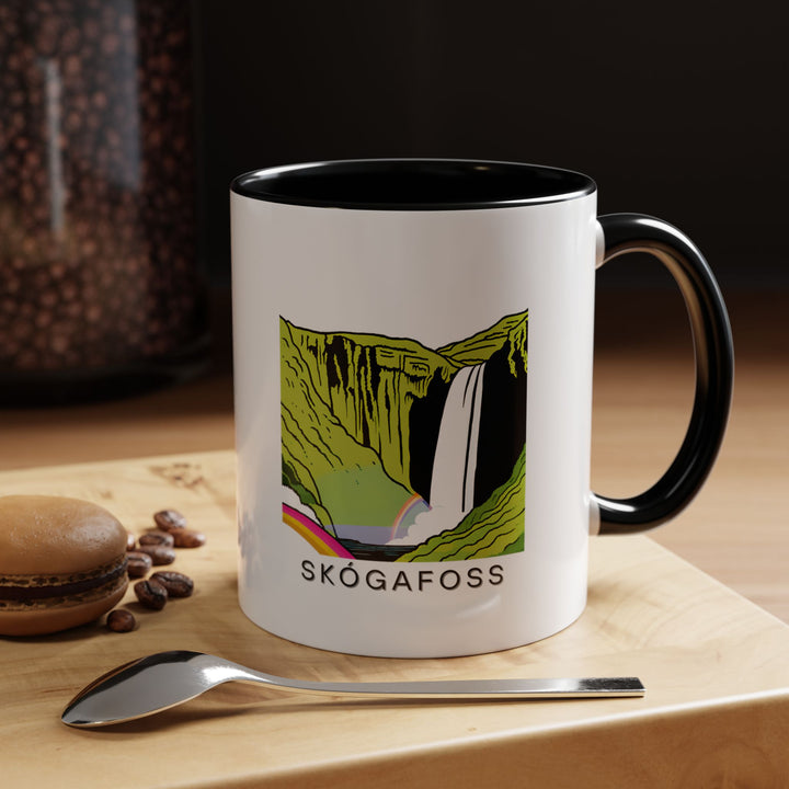 The Skógafoss Iceland mug is designed to bring the beauty of Iceland’s Skógafoss waterfall to your home. Made from durable ceramic, it’s perfect for everyday use and a wonderful gift for nature lovers. Dishwasher and microwave safe.