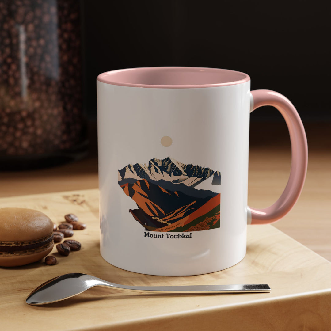 A Mount Toubkal mug featuring vibrant artwork of Morocco’s famous peak. This durable ceramic mug is perfect for enjoying your morning coffee and is dishwasher-safe for easy cleaning.