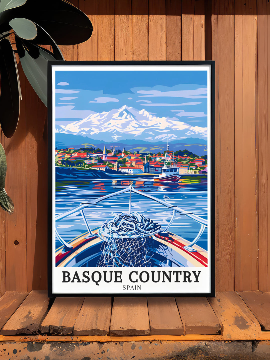 A framed art print of the Basque Country, featuring the idyllic village of Hondarribia and the towering peaks of the Pyrenees. This Spain Travel Art adds a serene and timeless touch to any room, perfect for art collectors and travelers.