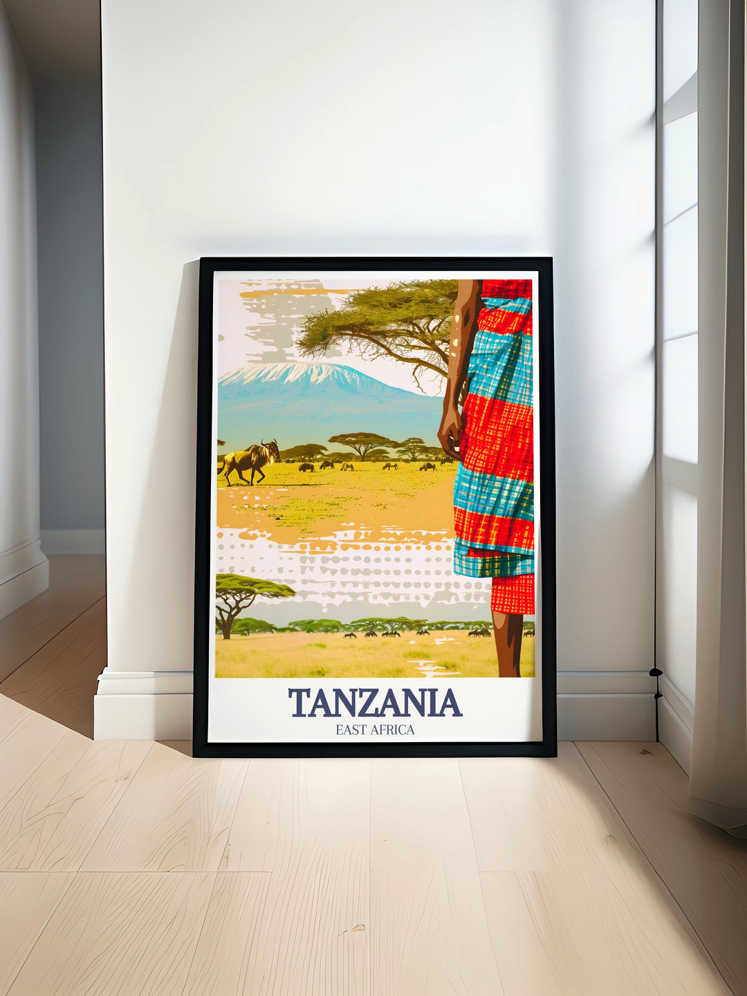 A vibrant poster print of Tanzanias Serengeti National Park and Mount Kilimanjaro, capturing the essence of Tanzanias most famous landmarks. This artwork is ideal for anyone looking to add a touch of African beauty to their home decor.