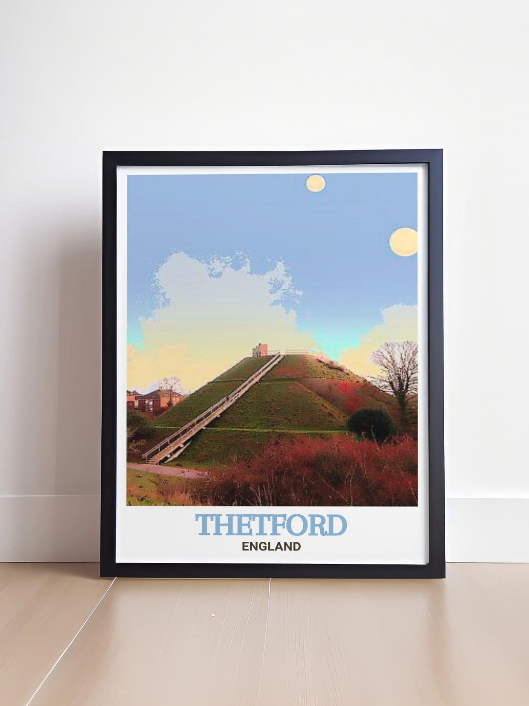 Explore the beauty of Thetford with this wall decor featuring Castle Hill, an iconic site in England. This print captures the natural and historical beauty of the area, making it an ideal piece for anyone who loves English landscapes and history