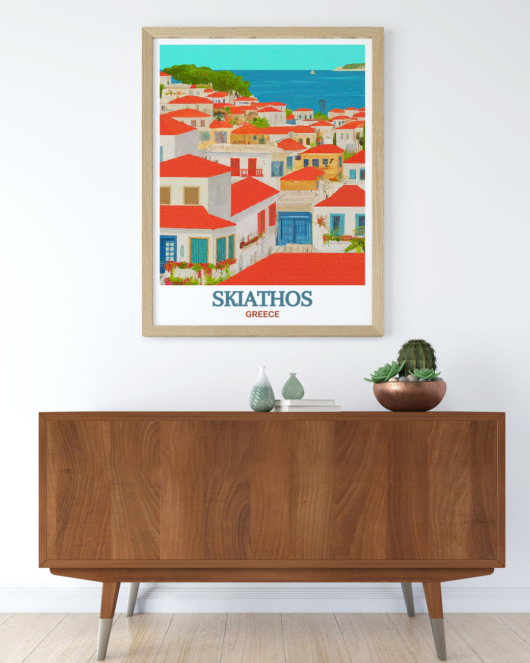 Wall art of Skiathos Town in Greece. This print beautifully captures the traditional architecture and scenic views of the island, bringing a piece of Mediterranean charm to your living space. Ideal for decor and gifts.